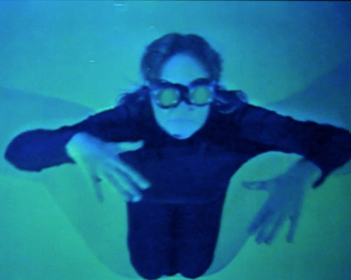 UNDER WATER A STRANGE PERSON IN A STRANGE PLACE